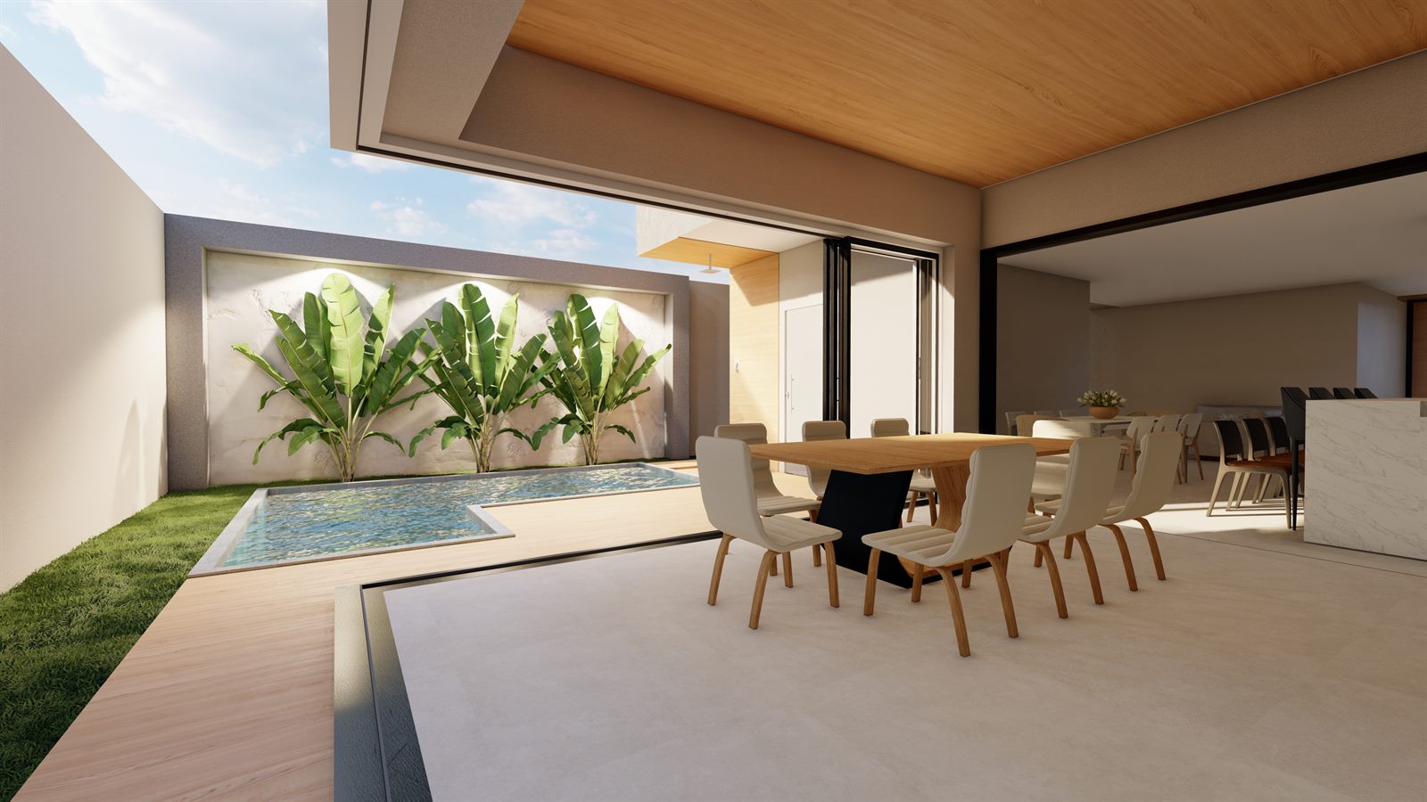 Living amplo integrado ao espaço de lazer e à piscina