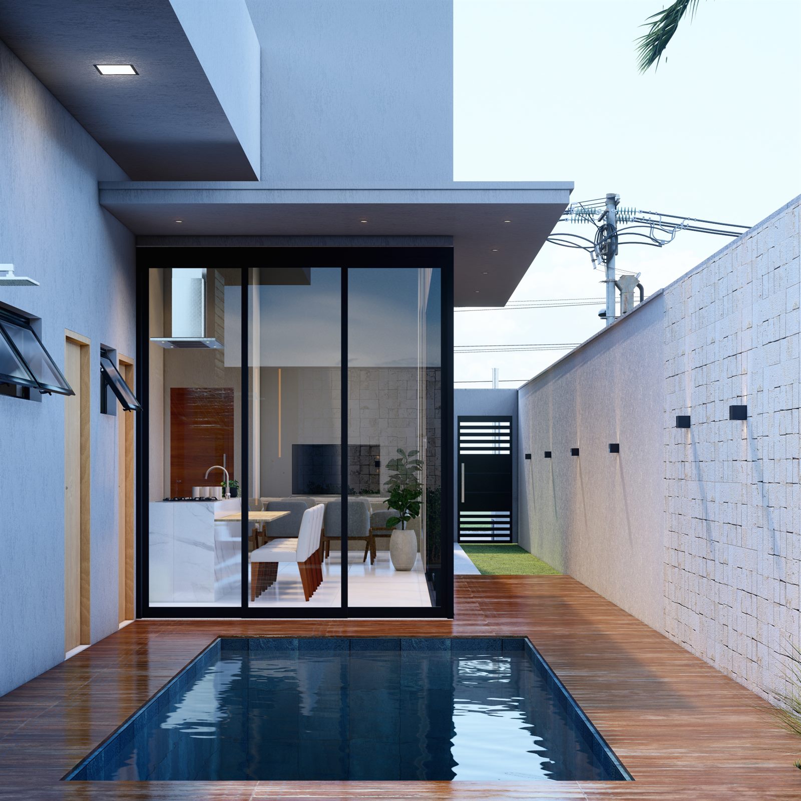 Piscina integrada ao living envidraçado